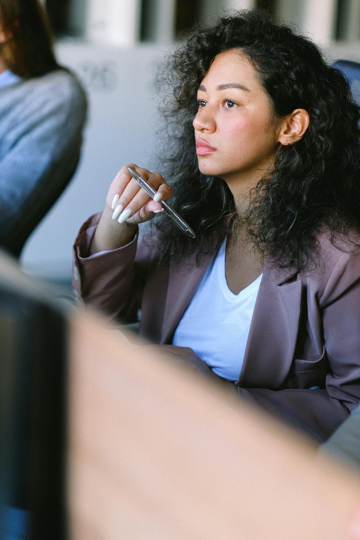 picture of a woman being thoughtful.